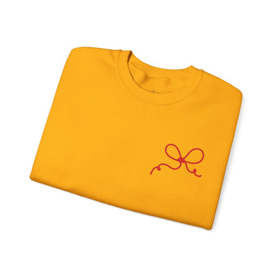 Yellow Coquette Bow Crewneck Sweatshirt with red bow design on front and back "The King is Born" text, cotton-poly blend, festive style