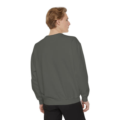 Cozy unisex garment-dyed sweatshirt with minimalist embroidery, soft cotton-polyester blend, ribbed cuffs and hem, model shown from back