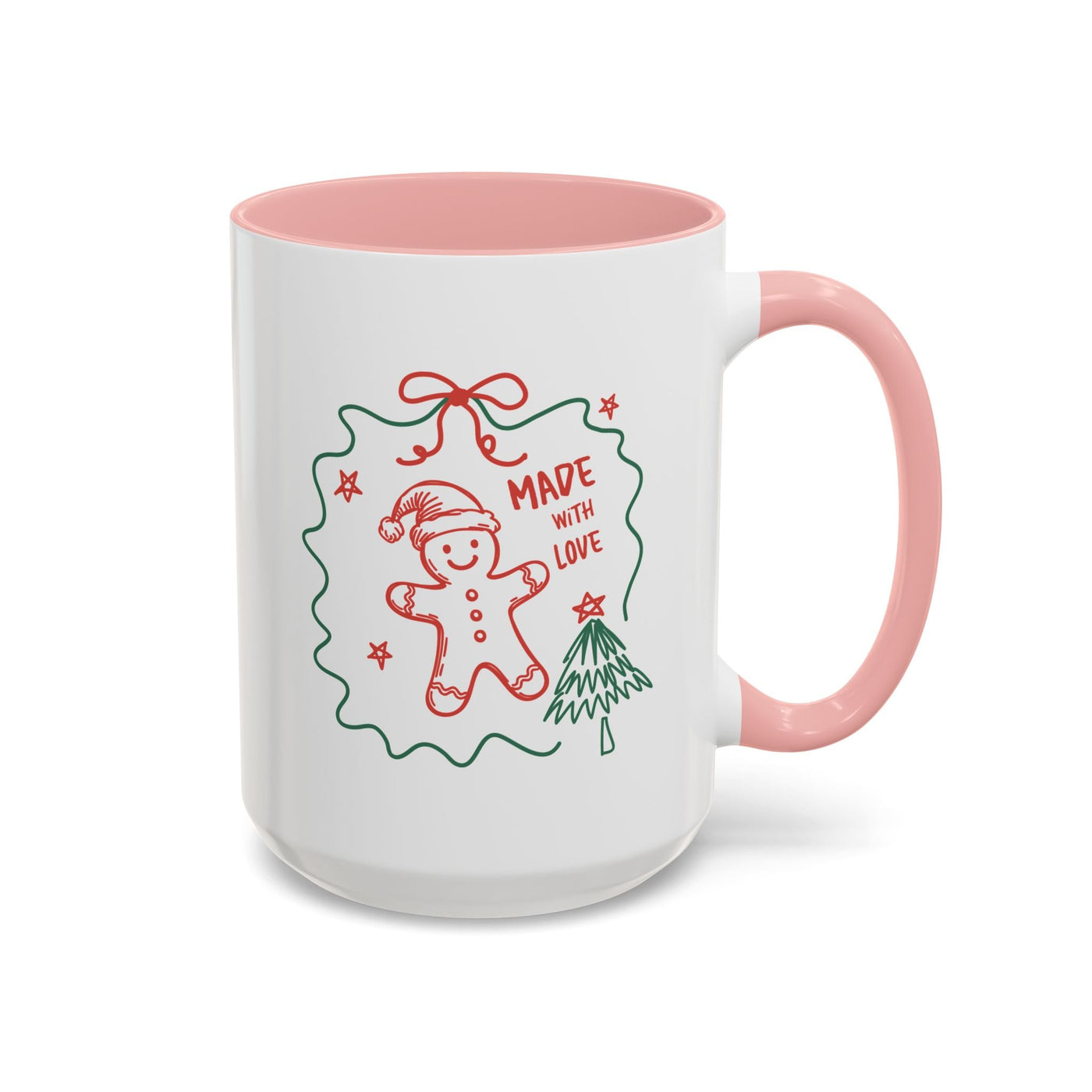 Festive Christmas coffee mug with pink handle and interior, featuring a gingerbread man and tree design with "Made with Love" text
