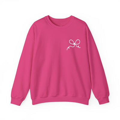 Pink coquette bow crewneck sweatshirt with front bow design and festive holiday style