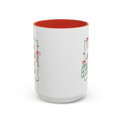 White ceramic Fa La La Christmas coffee mug with red interior and minimalist holiday design