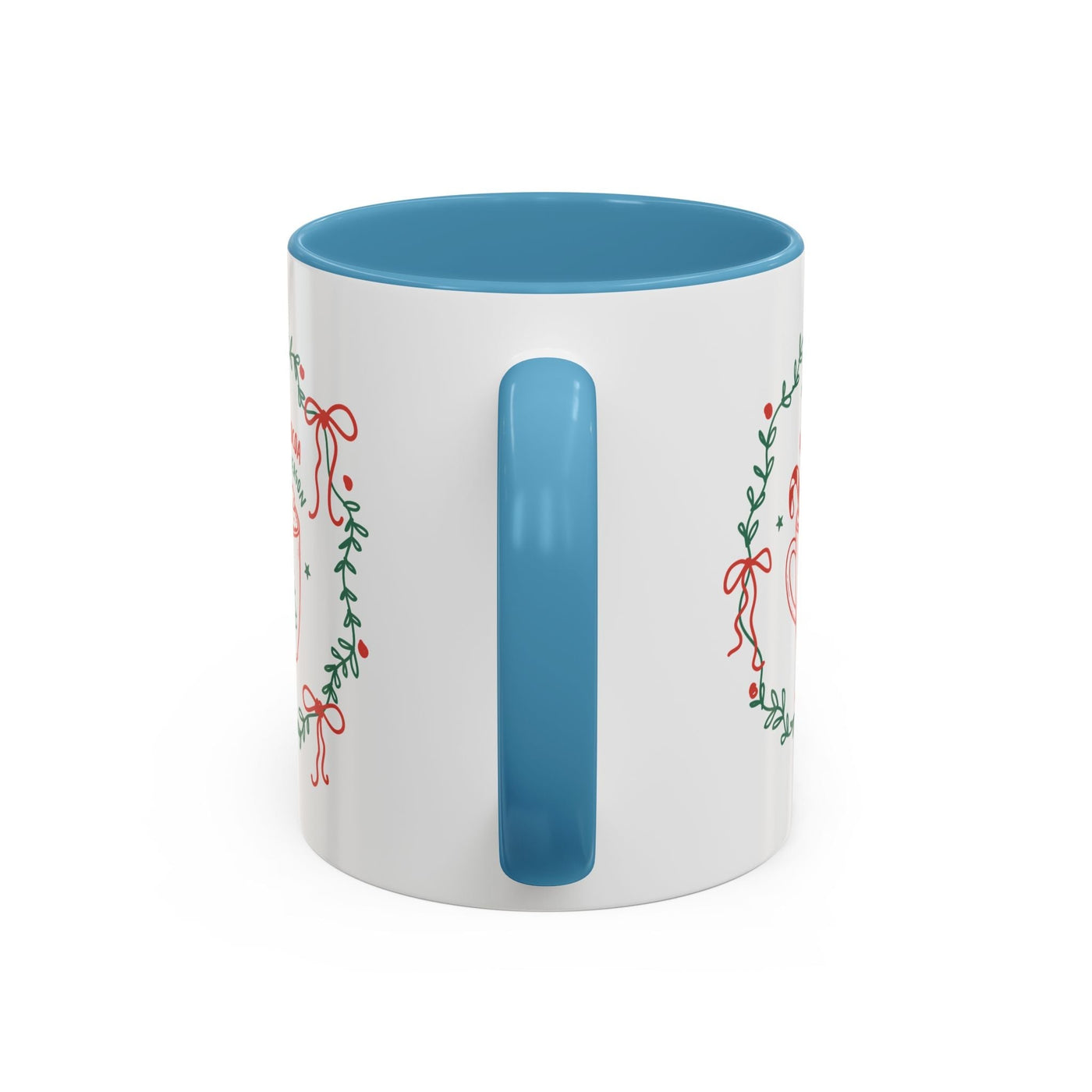 White ceramic mug with blue interior and handle featuring festive red and green holiday wreath design