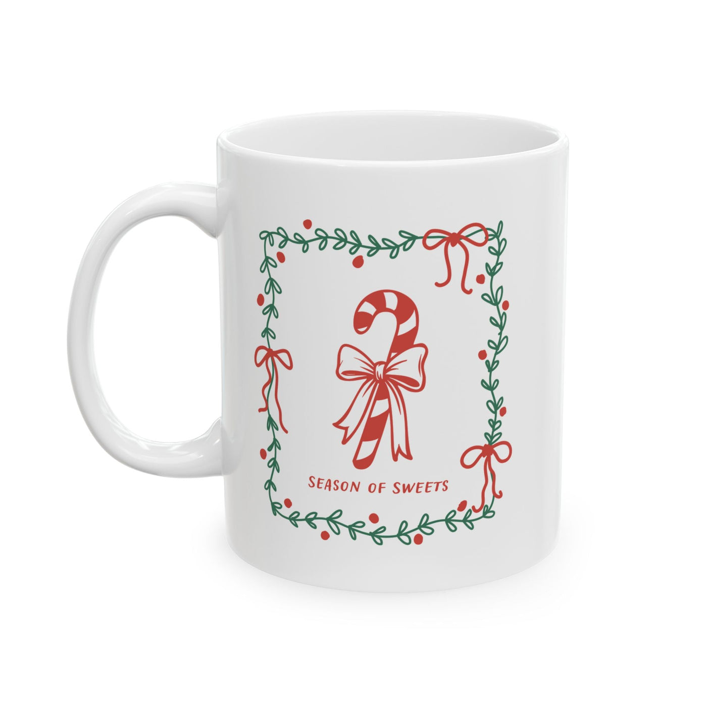 White ceramic mug with green border and candy cane "Season of Sweets" design, available in 11oz and 15oz sizes