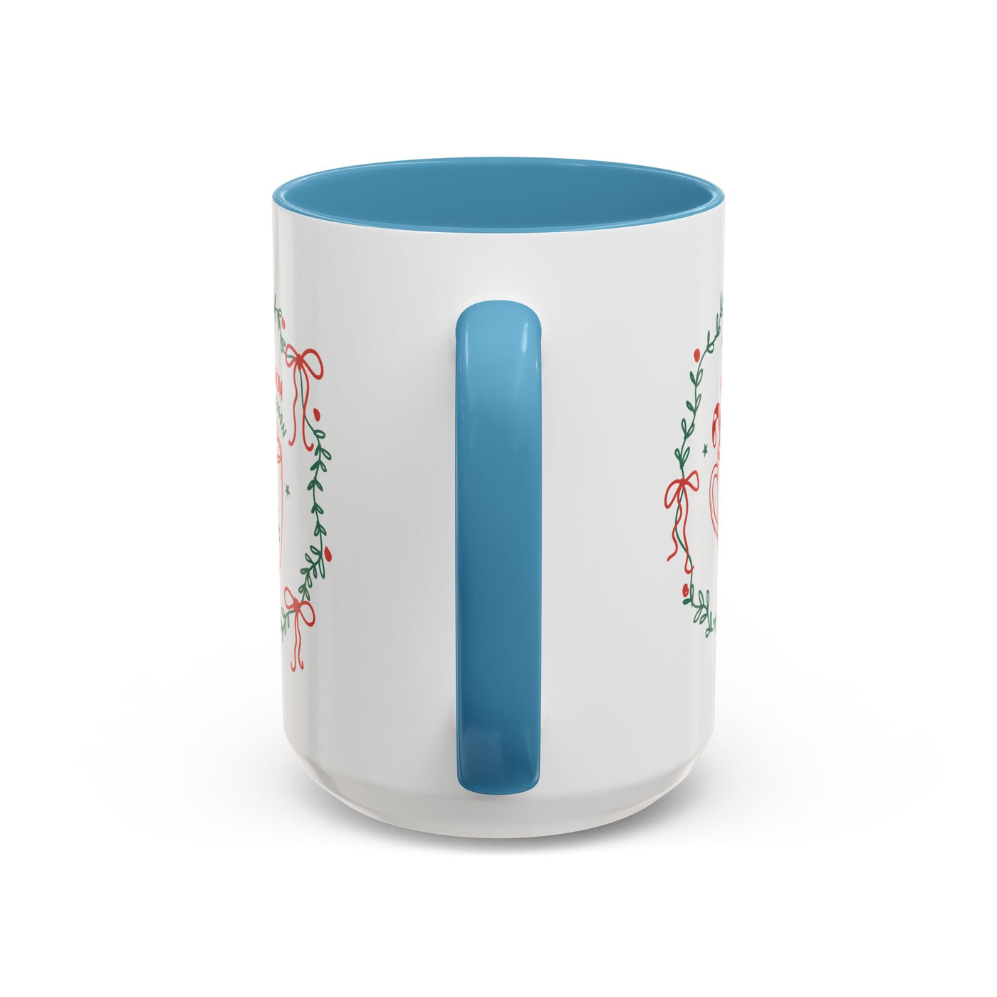White ceramic mug with blue handle and interior, festive greenery design, available in 11oz and 15oz sizes