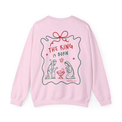 Pink Coquette Bow Crewneck Sweatshirt with "The King is Born" faith design and nativity scene on back