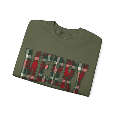 Folded olive green sweatshirt with large plaid "MERRY" Christmas graphic in red and green