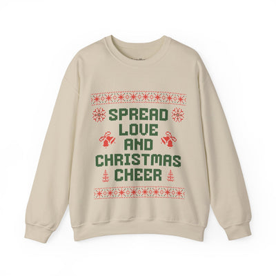 Cozy unisex crewneck sweatshirt with Spread Love and Christmas Cheer holiday design in green and red on beige background