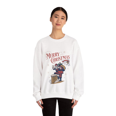 woman wearing white vintage Santa crewneck sweatshirt with Santa carrying gift bag going into chimney and Merry Christmas text
