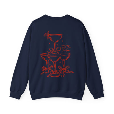 Navy Holiday Bow Crewneck Sweatshirt with festive red champagne tower and bow design on back, comfortable classic fit for adults