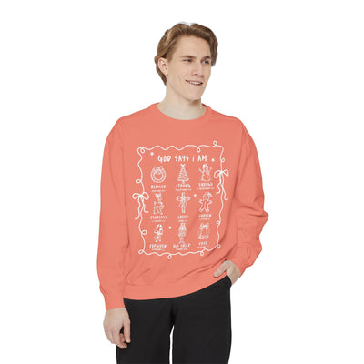 Man wearing coral God Says I Am inspirational crewneck sweatshirt with white Bible verse embroidery designs