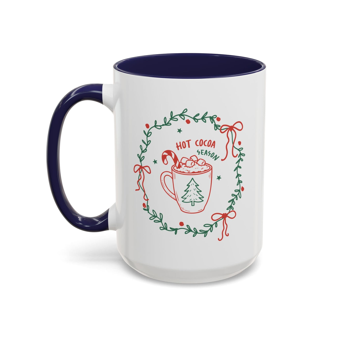 White ceramic mug with red and green hot cocoa season design and navy interior and handle