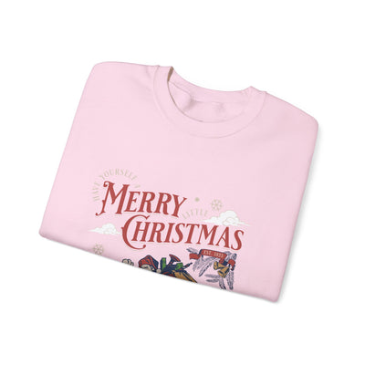 Pink vintage Santa crewneck sweatshirt with Merry Christmas holiday design and Santa carrying gift bag near chimney