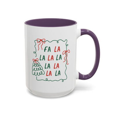 White ceramic Fa La La Christmas coffee mug with purple handle and interior, holiday-themed minimalist design with red and green text and bows
