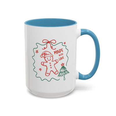 Minimalist festive Christmas coffee mug with gingerbread man and tree design, blue handle, and interior, available in 11oz and 15oz ceramic sizes