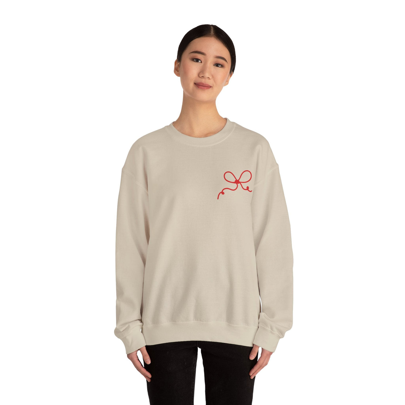 Coquette Bow Crewneck Sweatshirt with red bow design on beige fabric, casual unisex fit