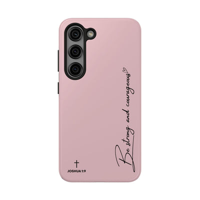 Pink inspirational tough phone case with "Be strong and courageous" text and Joshua 1:9 verse, durable protective design for iPhone and Samsung.