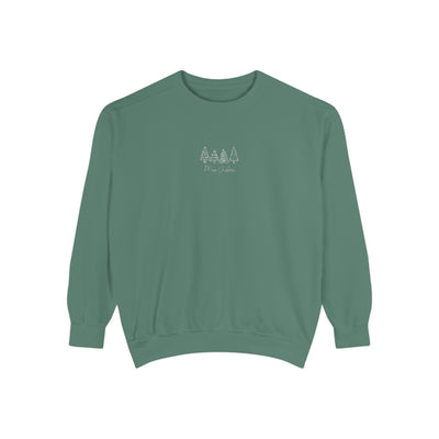 Cozy unisex garment-dyed sweatshirt in muted green with minimalist tree embroidery, ribbed cuffs, and relaxed fit.