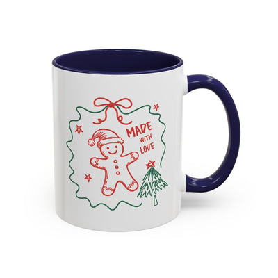 Festive Christmas coffee mug with gingerbread design and "Made with Love" text, blue handle and interior, ceramic, 11oz and 15oz sizes.