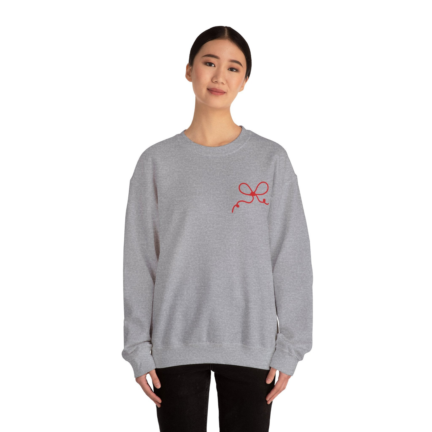Gray Coquette Bow Crewneck Sweatshirt with red bow design on front, worn by model