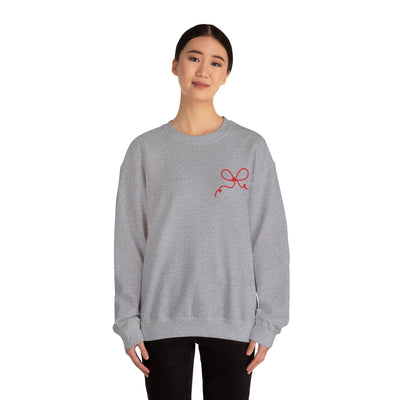 Gray Coquette Bow Crewneck Sweatshirt with red bow design on front, worn by model