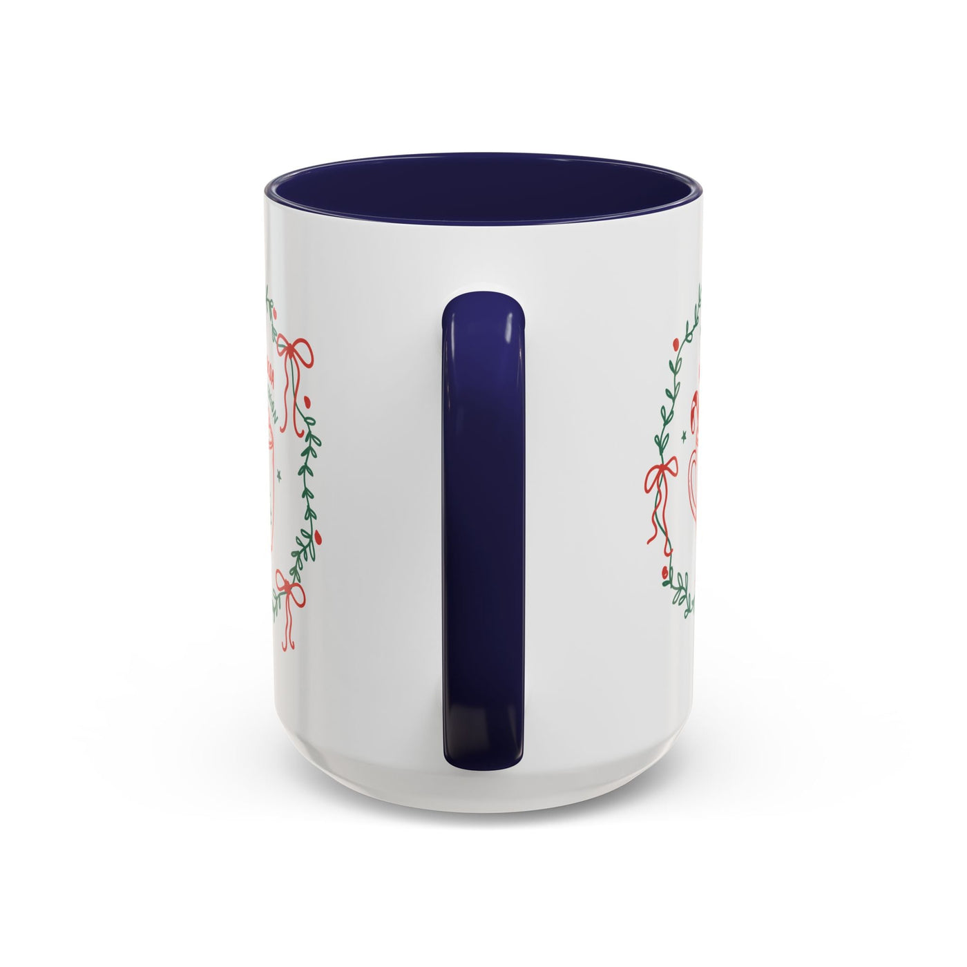 White ceramic mug with navy handle and interior, festive greenery and ribbon design, available in 11oz and 15oz sizes