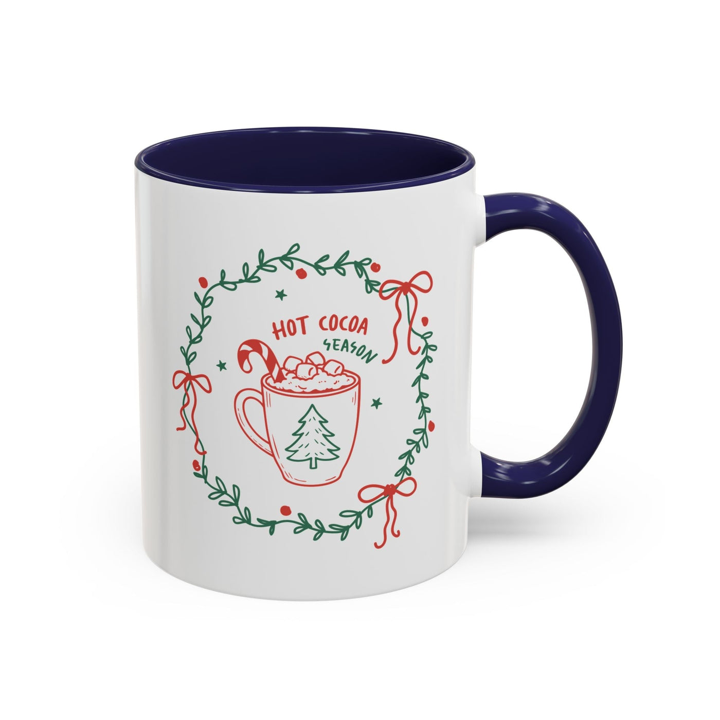white ceramic mug with blue interior and handle featuring hot cocoa season design with festive wreath and candy cane illustration