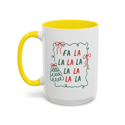Fa La La Christmas Coffee Mug with yellow handle and festive holiday text design on white ceramic cup