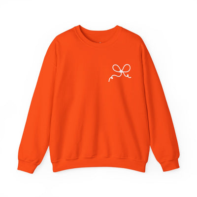 Orange Coquette Bow Crewneck Sweatshirt with white bow design, comfortable cotton-poly blend, festive style