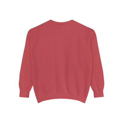 Back view of cozy unisex garment-dyed sweatshirt in muted red with ribbed cuffs and hem, minimalist design.