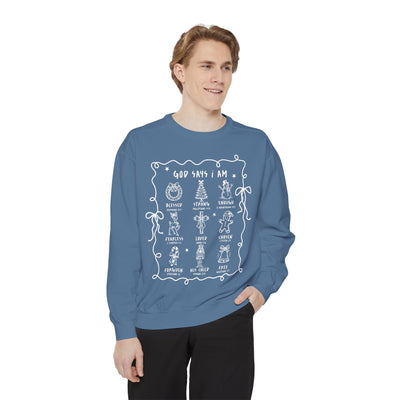 God Says I Am blue crewneck sweatshirt with inspirational Bible verse designs by Brew’d Up Designs worn by smiling man