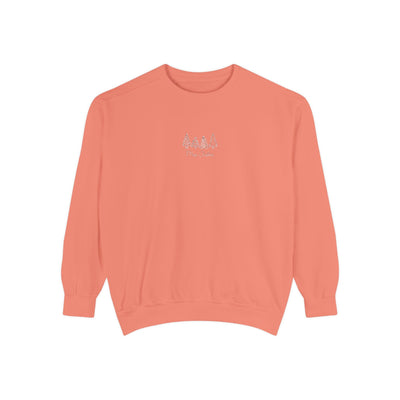 Cozy unisex coral sweatshirt with minimalist tree embroidery and ribbed cuffs.