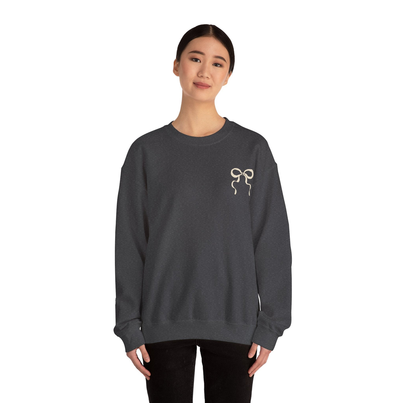 Coquette Christmas Faith Crewneck sweatshirt with coquette bow design, cozy unisex cotton-poly blend, ribbed knit collar, dark gray color.