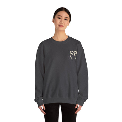Coquette Christmas Faith Crewneck sweatshirt with coquette bow design, cozy unisex cotton-poly blend, ribbed knit collar, dark gray color.