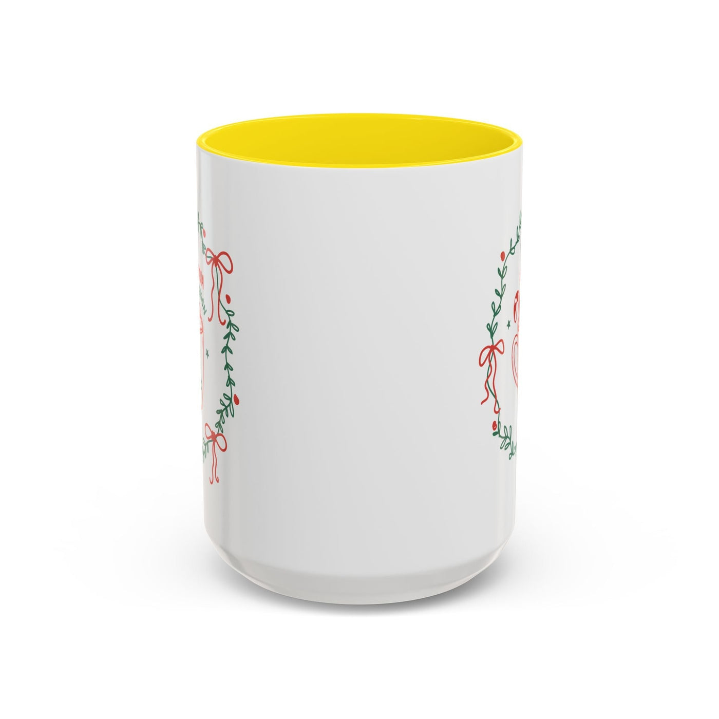 White ceramic mug with yellow interior and festive greenery design, available in 11oz and 15oz sizes