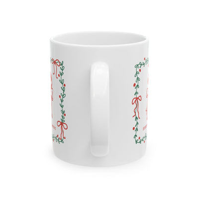 White ceramic mug with green border and candy cane "Season of Sweets" holiday design, available in 11oz and 15oz sizes.