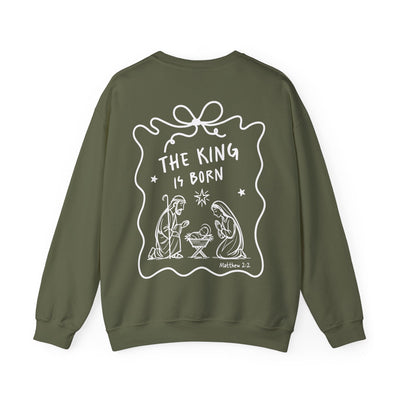 Olive Coquette Bow Crewneck Sweatshirt with "The King is Born" faith design and festive graphic