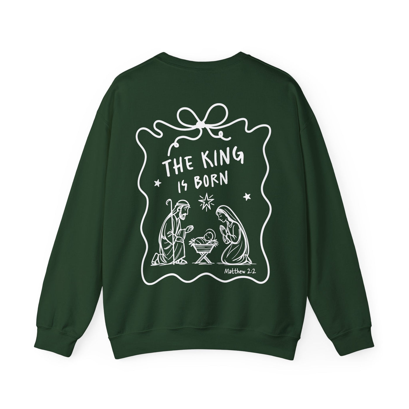 Dark green Coquette Bow Crewneck Sweatshirt with white "The King is Born" faith design and festive nativity illustration on back.