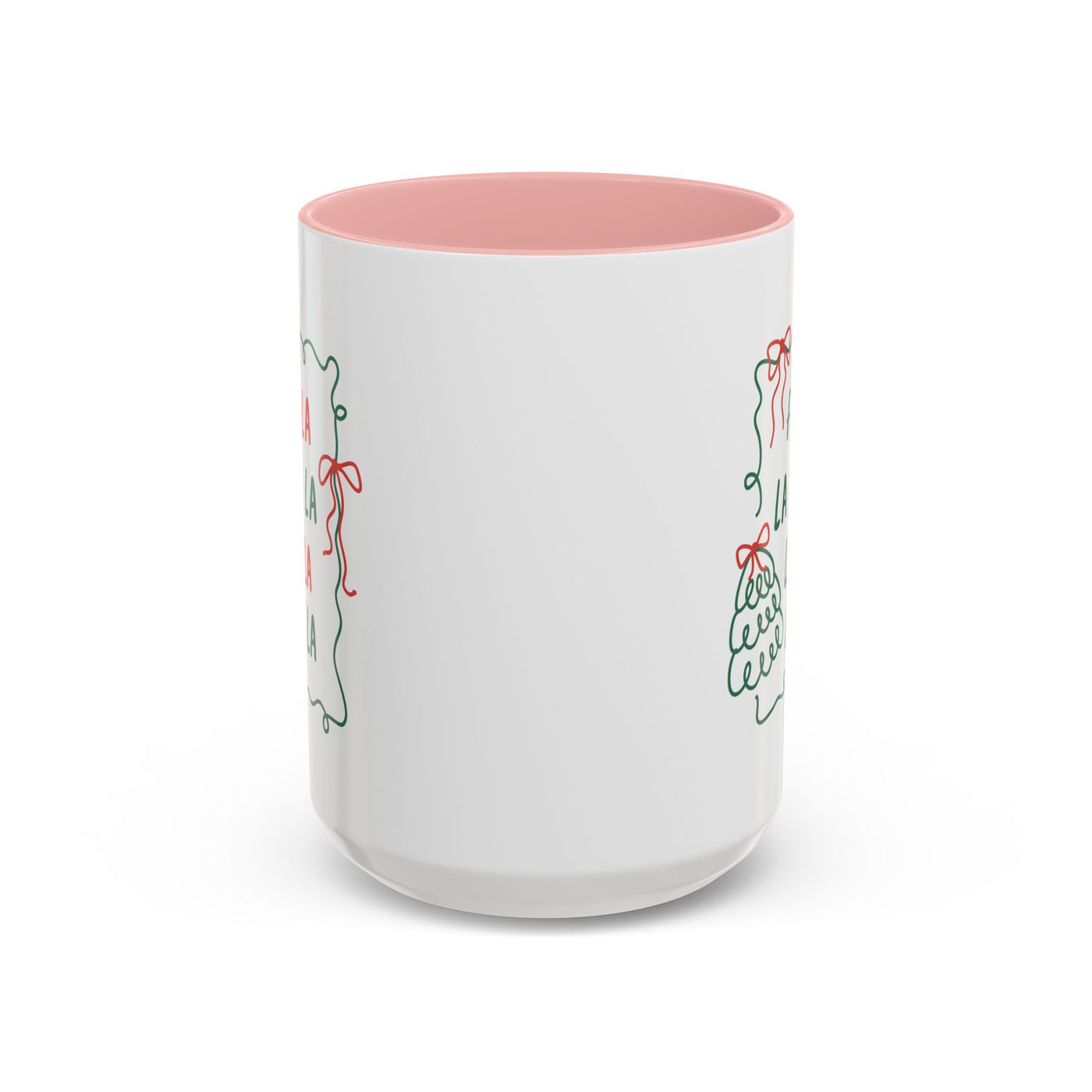 Fa La La Christmas Coffee Mug with minimalist holiday design, white ceramic, pink interior, microwave and dishwasher safe.