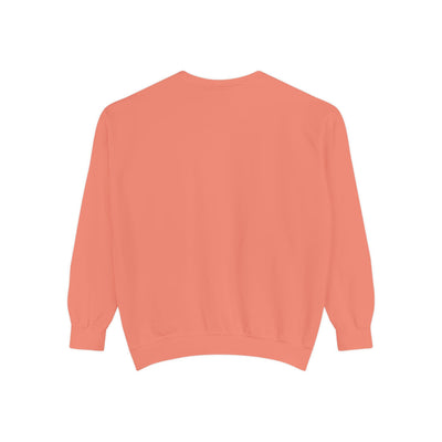 Back view of coral-colored unisex sweatshirt for mountain skiing with relaxed fit and ribbed cuffs and hem