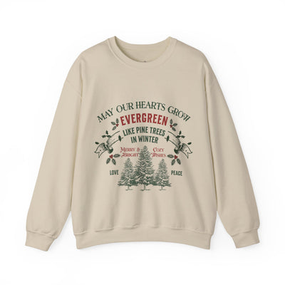 Beige Christmas crewneck sweatshirt with evergreen holiday design and festive text by Brew'd Up Designs