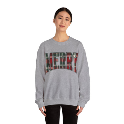 woman wearing grey crewneck sweatshirt with red and green plaid MERRY Christmas graphic