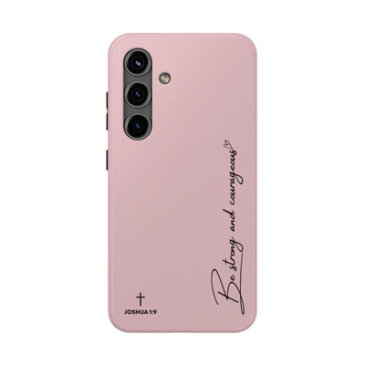 Pink inspirational tough phone case with "Be Strong and Courageous" text and Joshua 1:9 scripture, durable protective design for iPhone and Samsung.