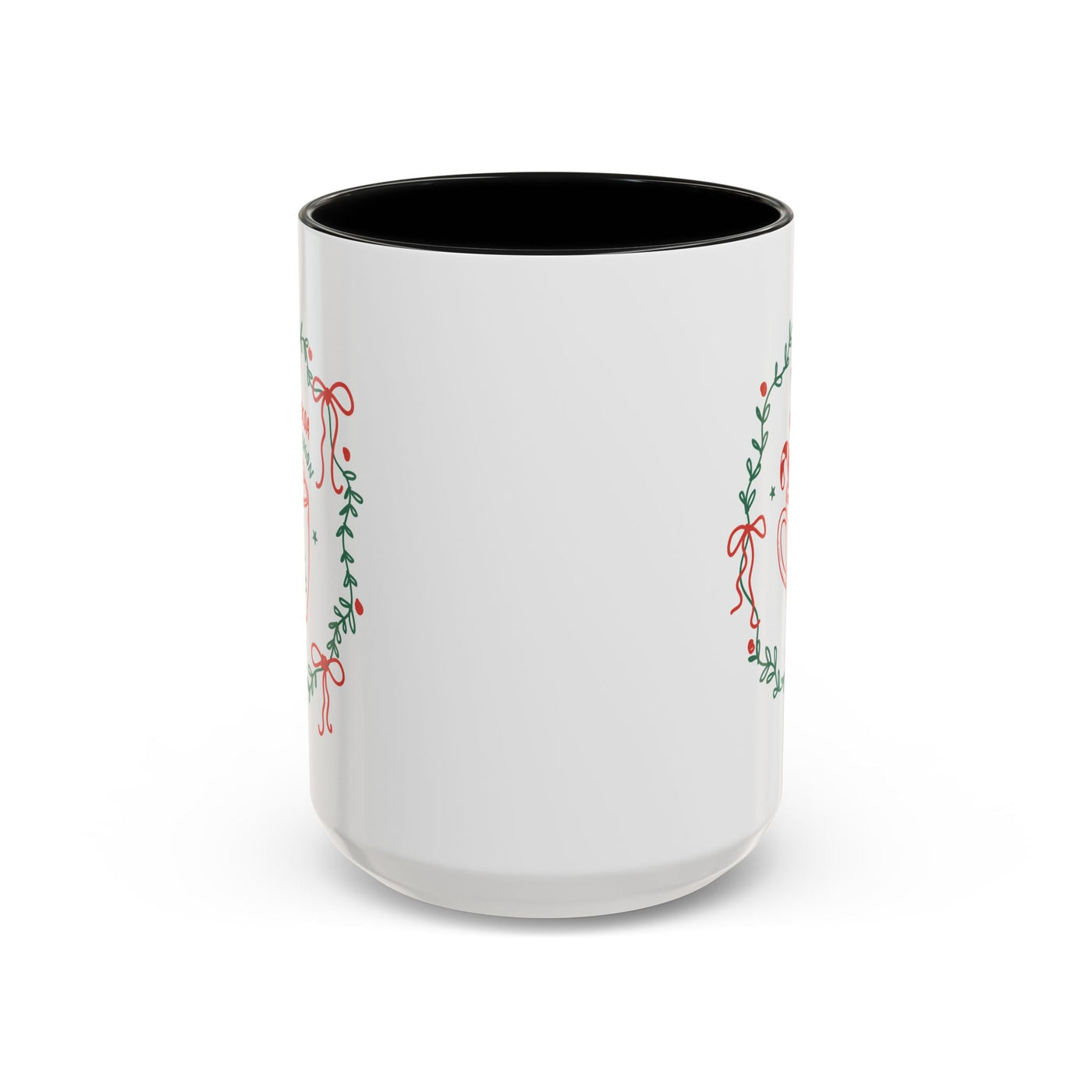 White ceramic mug with red interior and festive greenery design for hot cocoa season