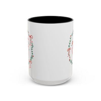 White ceramic mug with red interior and festive greenery design for hot cocoa season