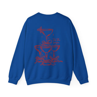 Blue Holiday Bow Crewneck Sweatshirt with festive champagne tower and bow design on back
