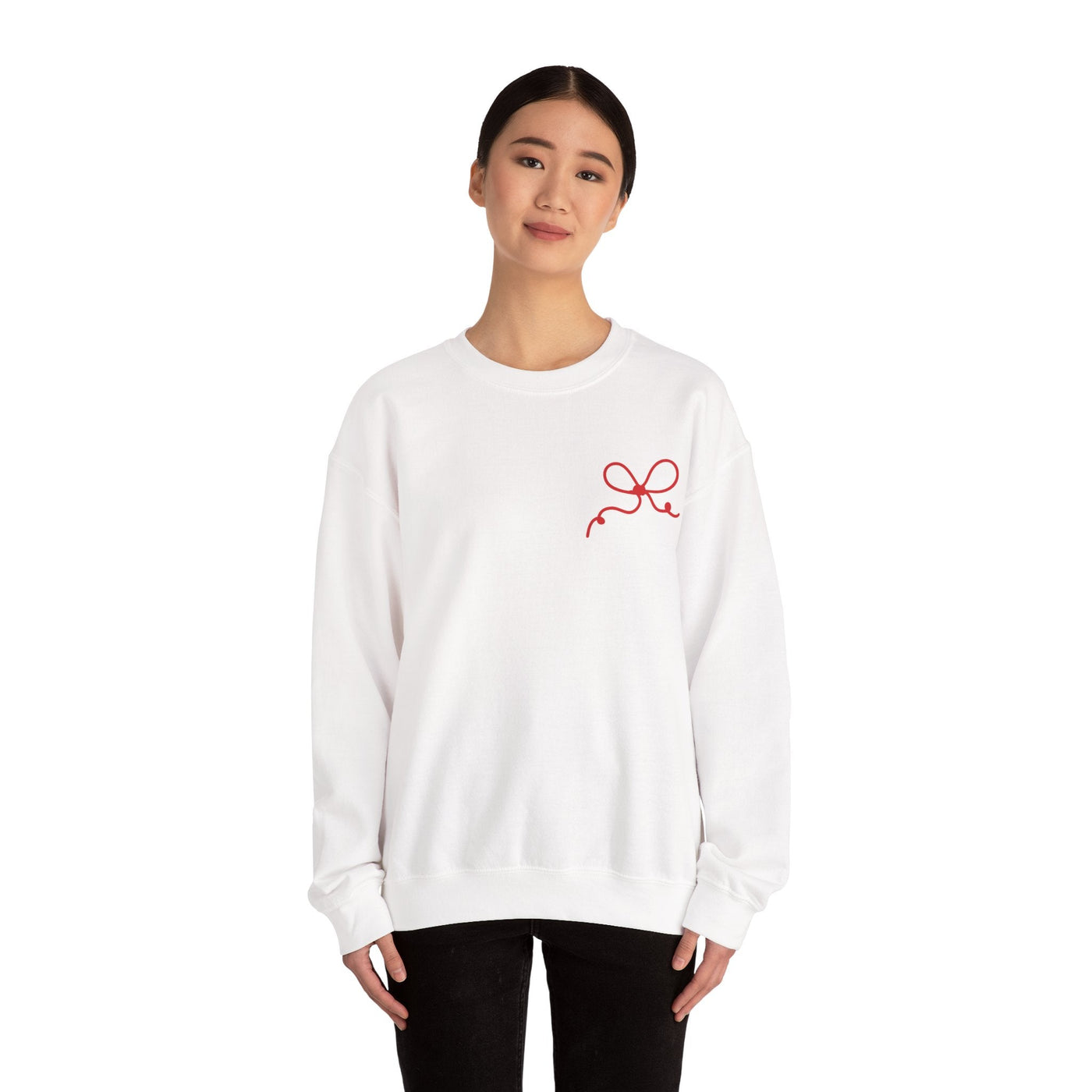 Woman wearing white Coquette Bow Crewneck Sweatshirt with red bow design on chest