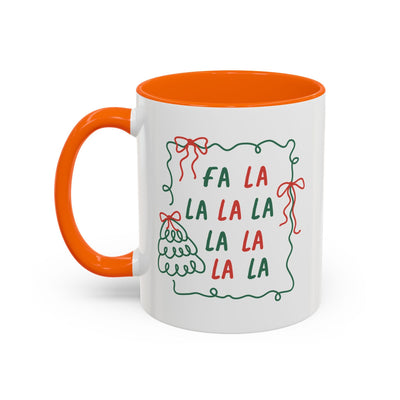 Fa La La Christmas Coffee Mug with orange handle and festive minimalist design on white ceramic