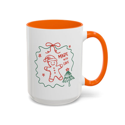 Festive Christmas coffee mug with orange handle and interior, featuring a gingerbread man and holiday design, available in 11oz and 15oz sizes.