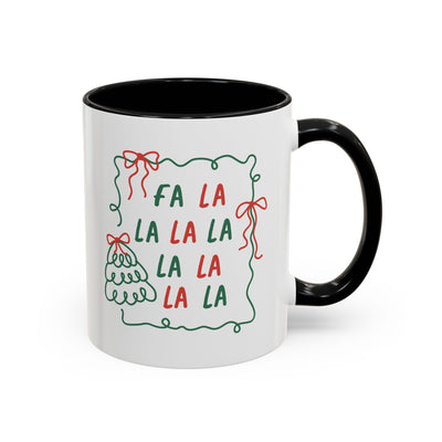 White ceramic Fa La La Christmas coffee mug with black handle and festive minimalist design