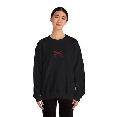 Black Holiday Bow Crewneck Sweatshirt with red bow embroidery on front, classic fit, cozy and festive design.